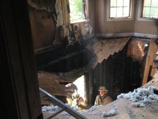 FIREMAN NARROWLY ESACAPES FLOOR COLLAPSE