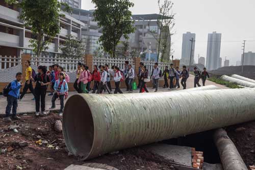 CHINA MOVING 250 MILLION PEOPLE INTO CITIES ACCORDING TO THE NEW YORK TIMES